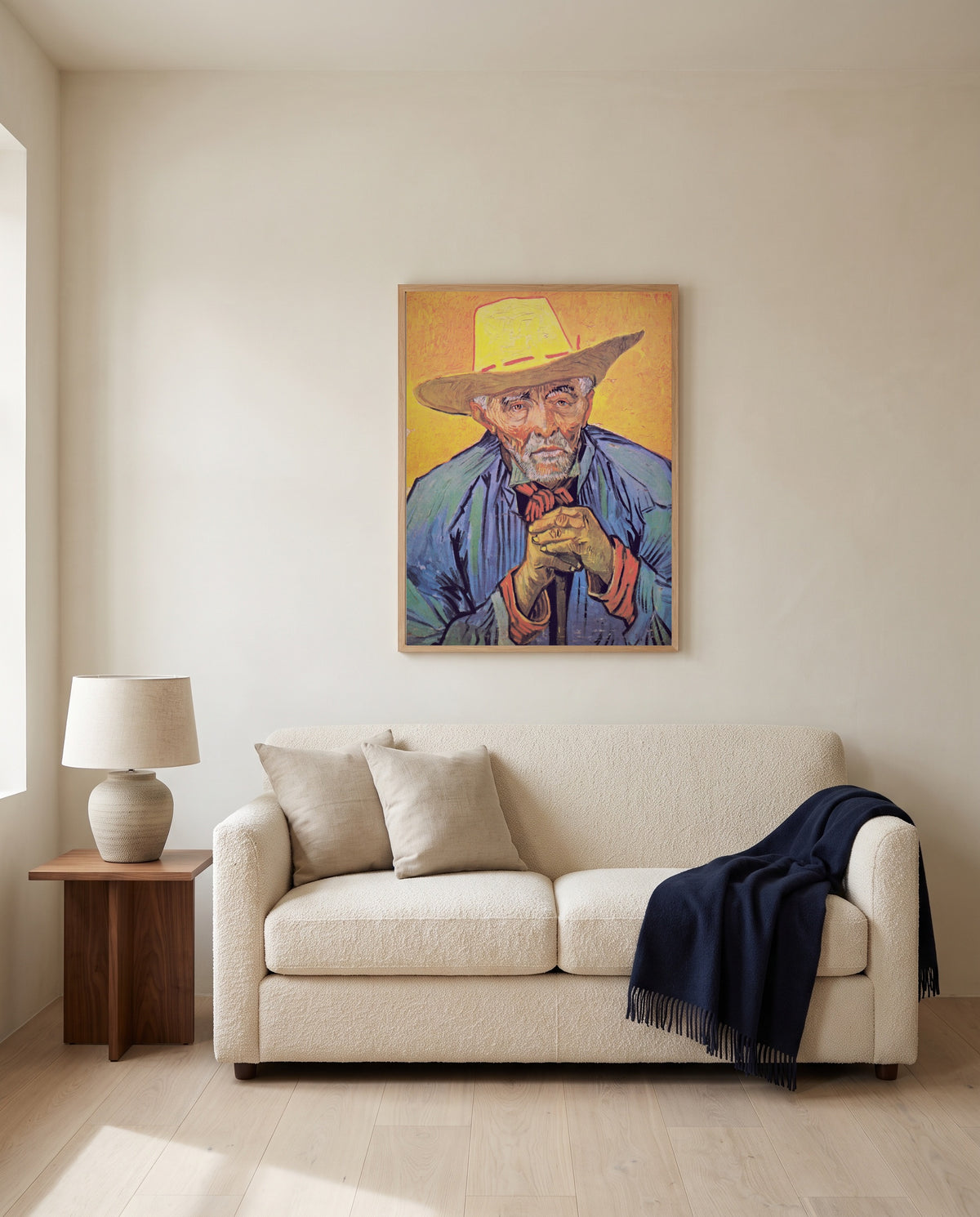 Patience Escalier by Vincent van Gogh framed in natural oak above a cream sofa in a warm living room