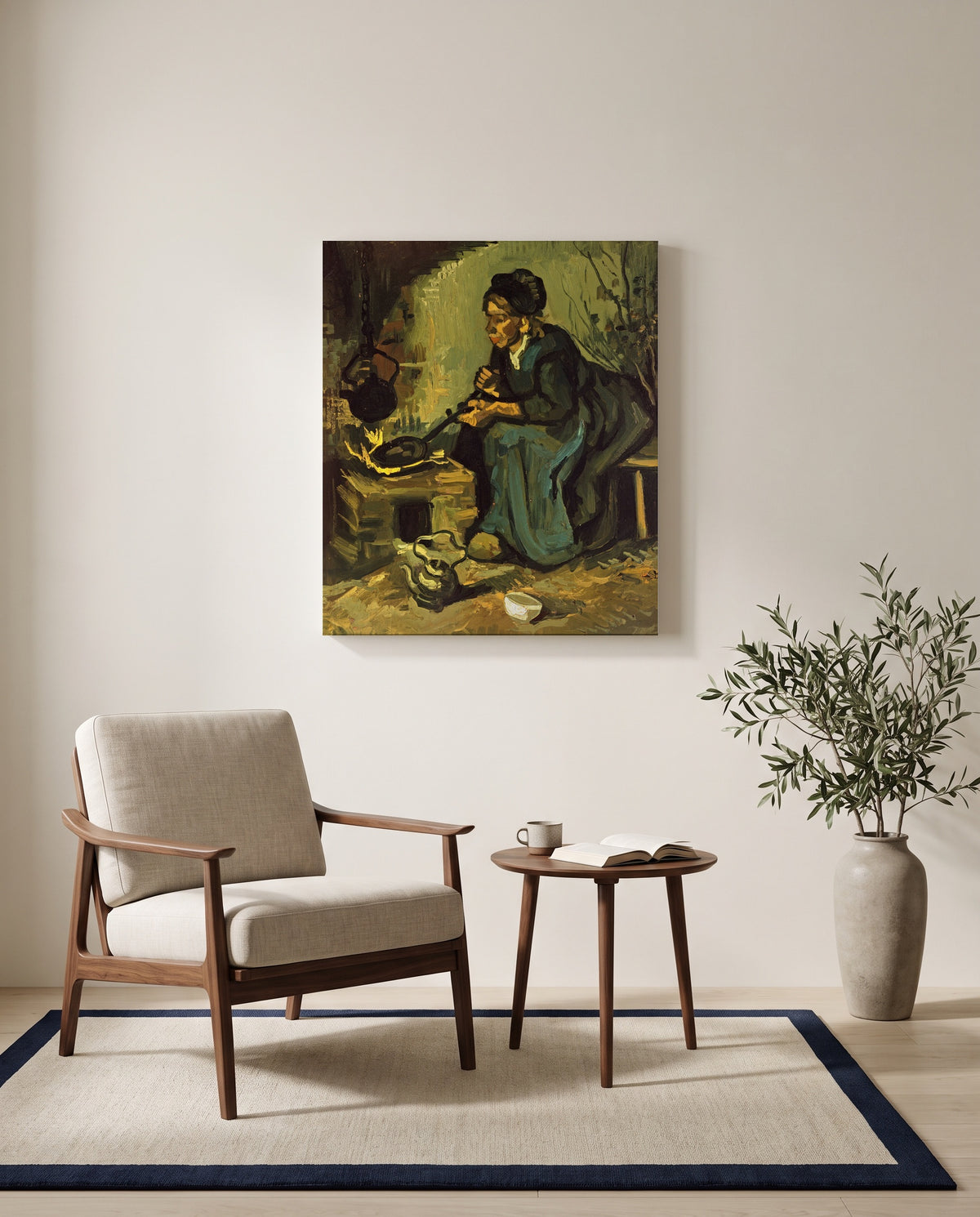 Peasant Woman Cooking by Vincent van Gogh as a stretched canvas above a linen lounge chair in a reading corner