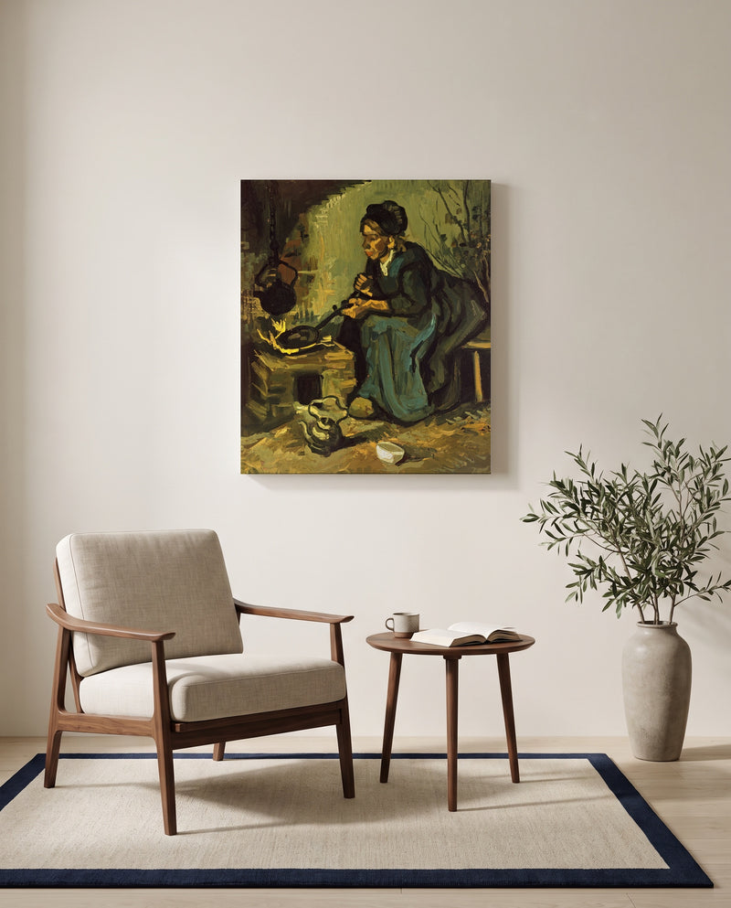 Peasant Woman Cooking by Vincent van Gogh as a stretched canvas above a linen lounge chair in a reading corner