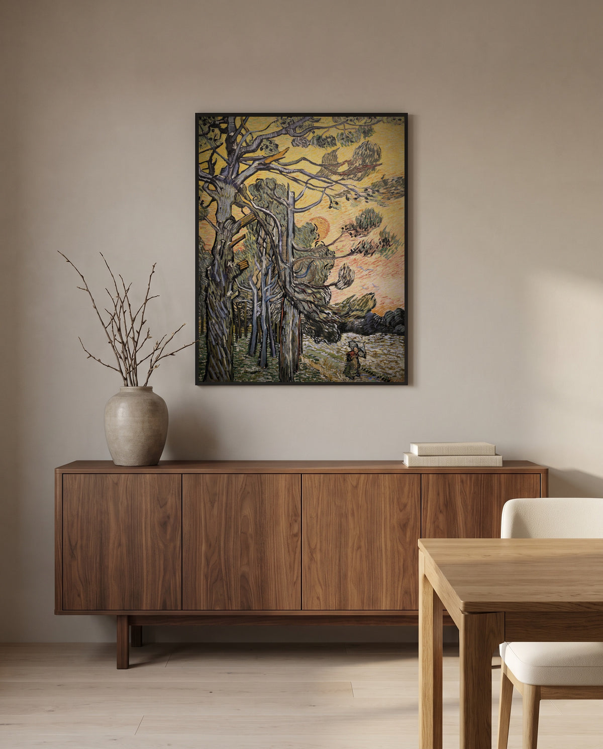 Pine Trees at Sunset by Vincent van Gogh in a black frame above a walnut sideboard in a dining room