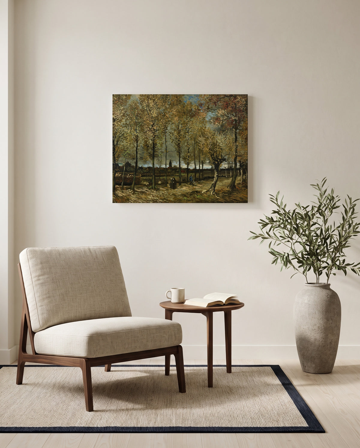 Poplars near Nuenen by Vincent van Gogh as a stretched canvas above a linen lounge chair in a reading corner