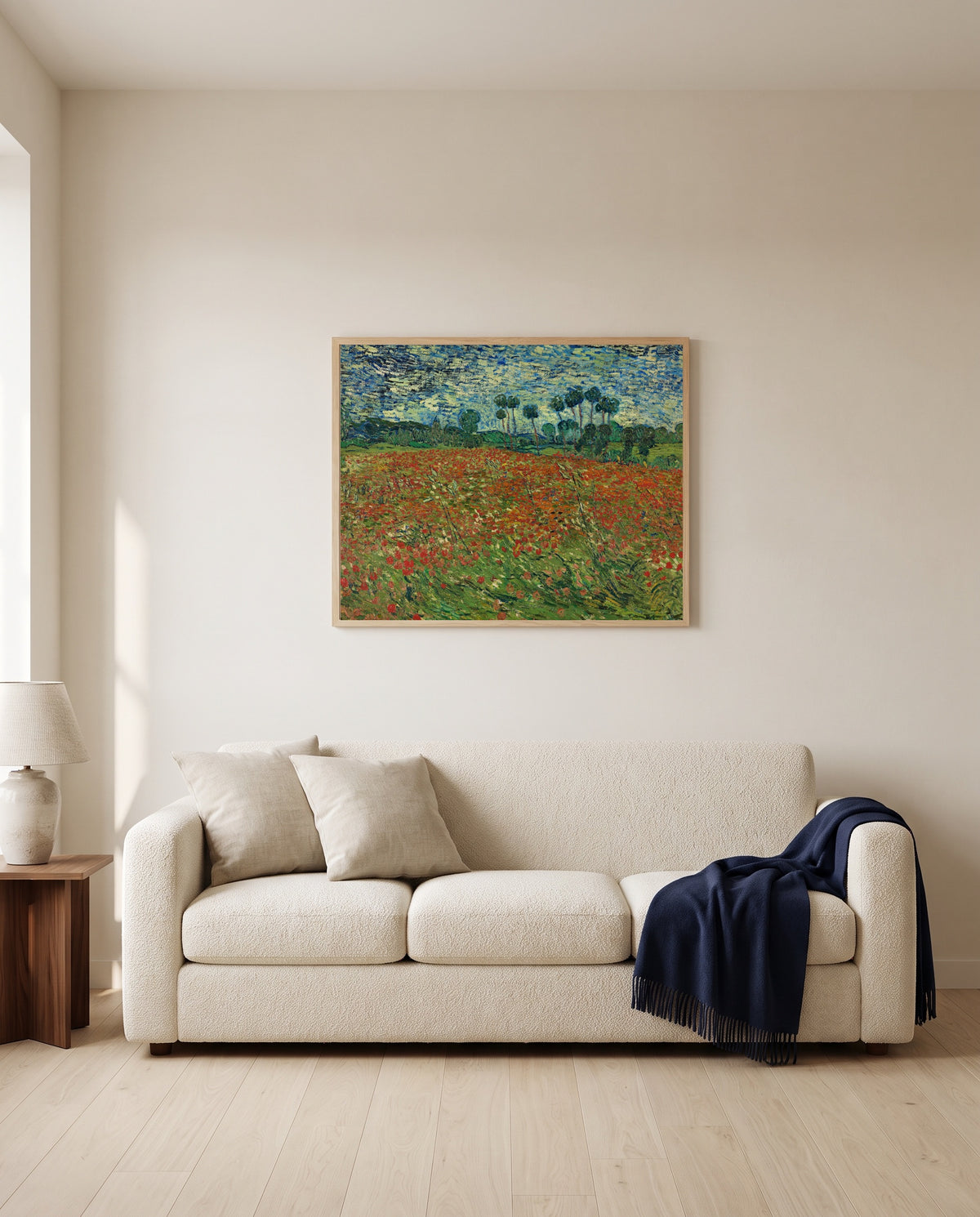 Poppy Field by Vincent van Gogh framed in natural oak above a cream sofa in a warm living room
