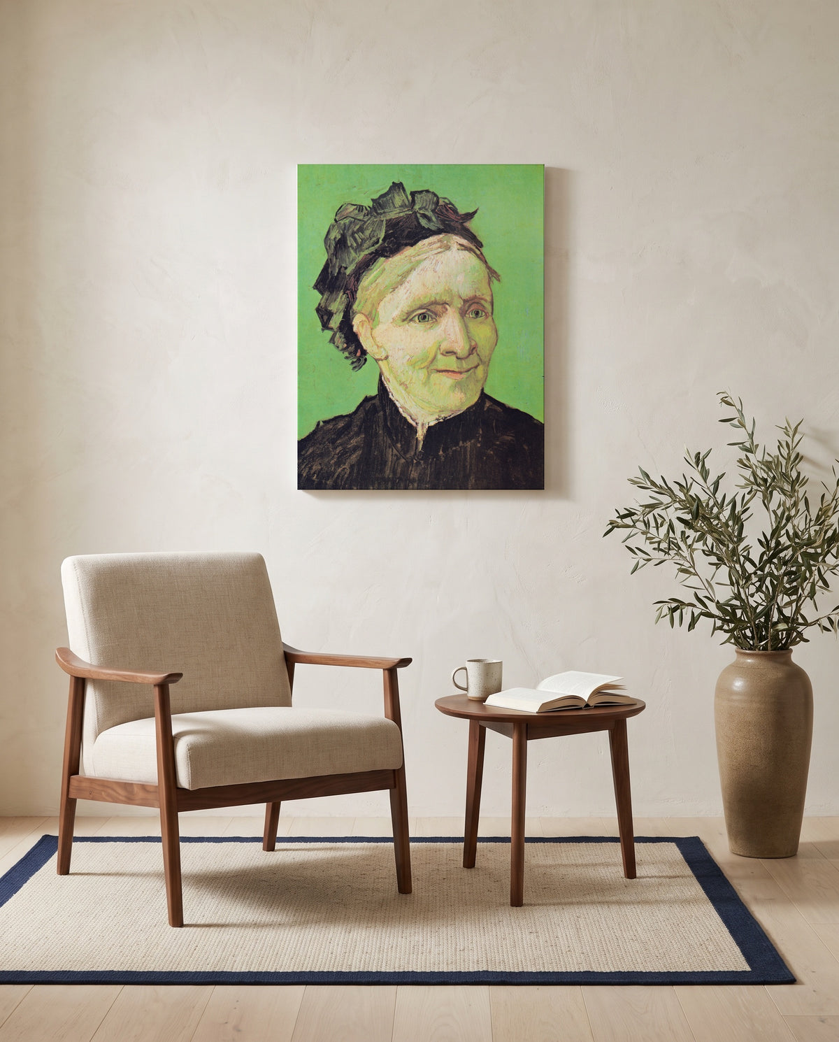 The Artist’s Mother by Vincent van Gogh as a stretched canvas above a linen lounge chair in a reading corner