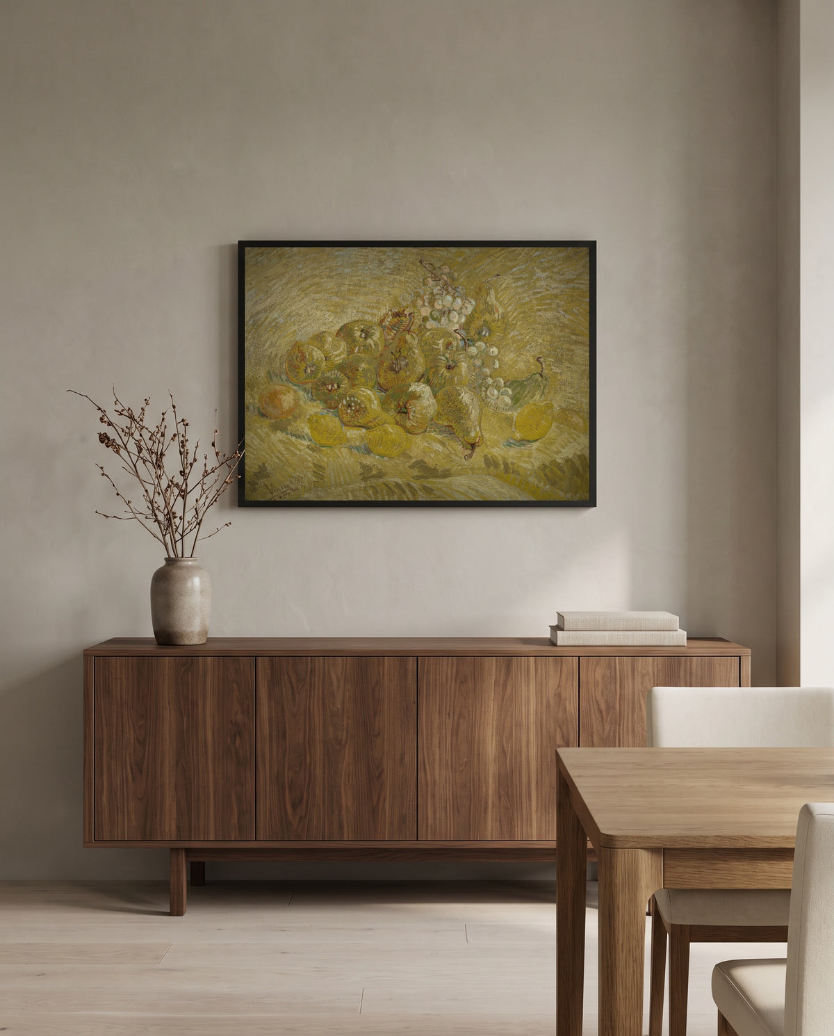 Quinces, Lemons, Pears and Grapes by Vincent van Gogh in a black frame above a walnut sideboard in a dining room