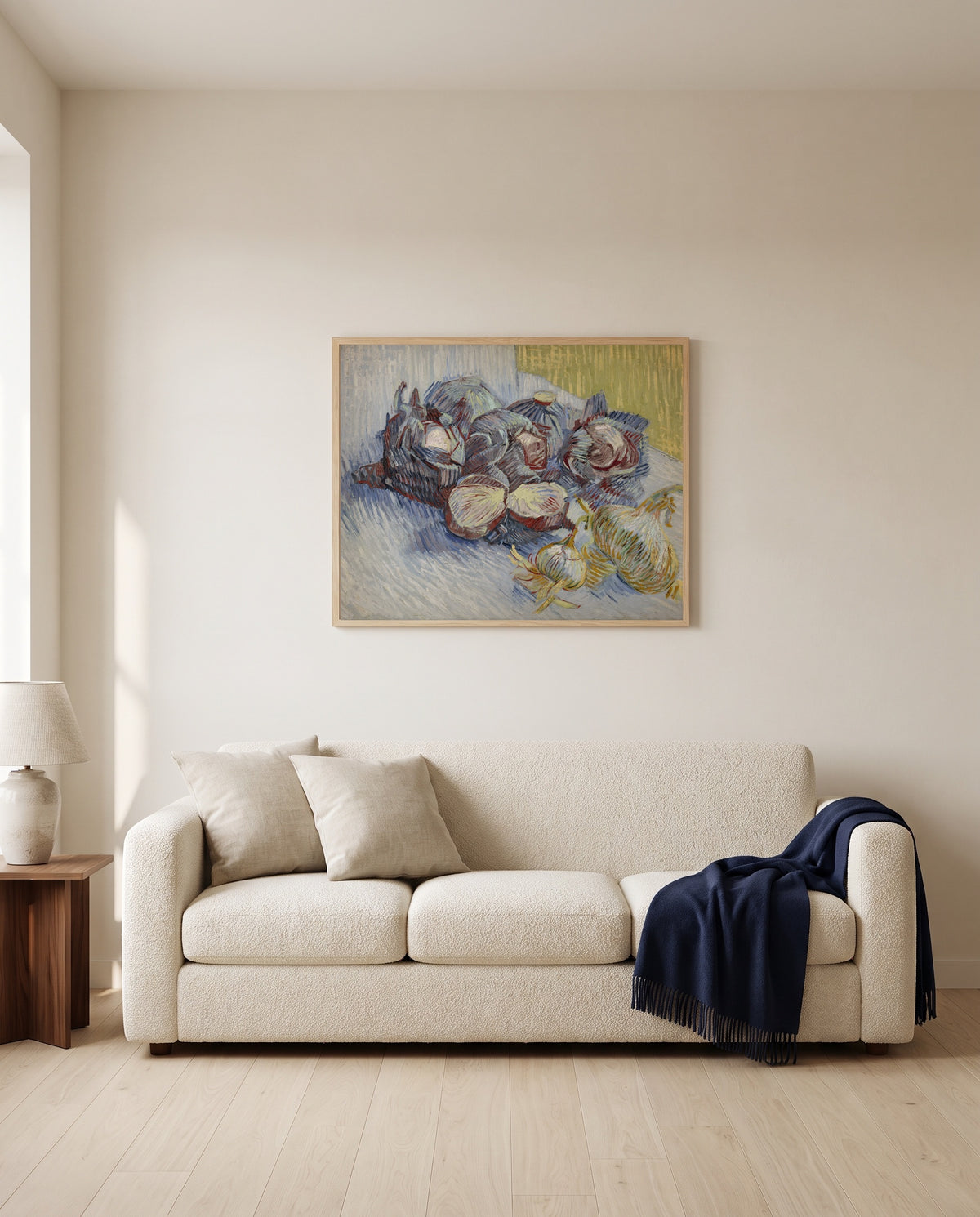 Red Cabbages and Garlic by Vincent van Gogh framed in natural oak above a cream sofa in a warm living room