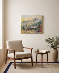 Restaurant de la Sirène by Vincent van Gogh as a stretched canvas above a linen lounge chair in a reading corner