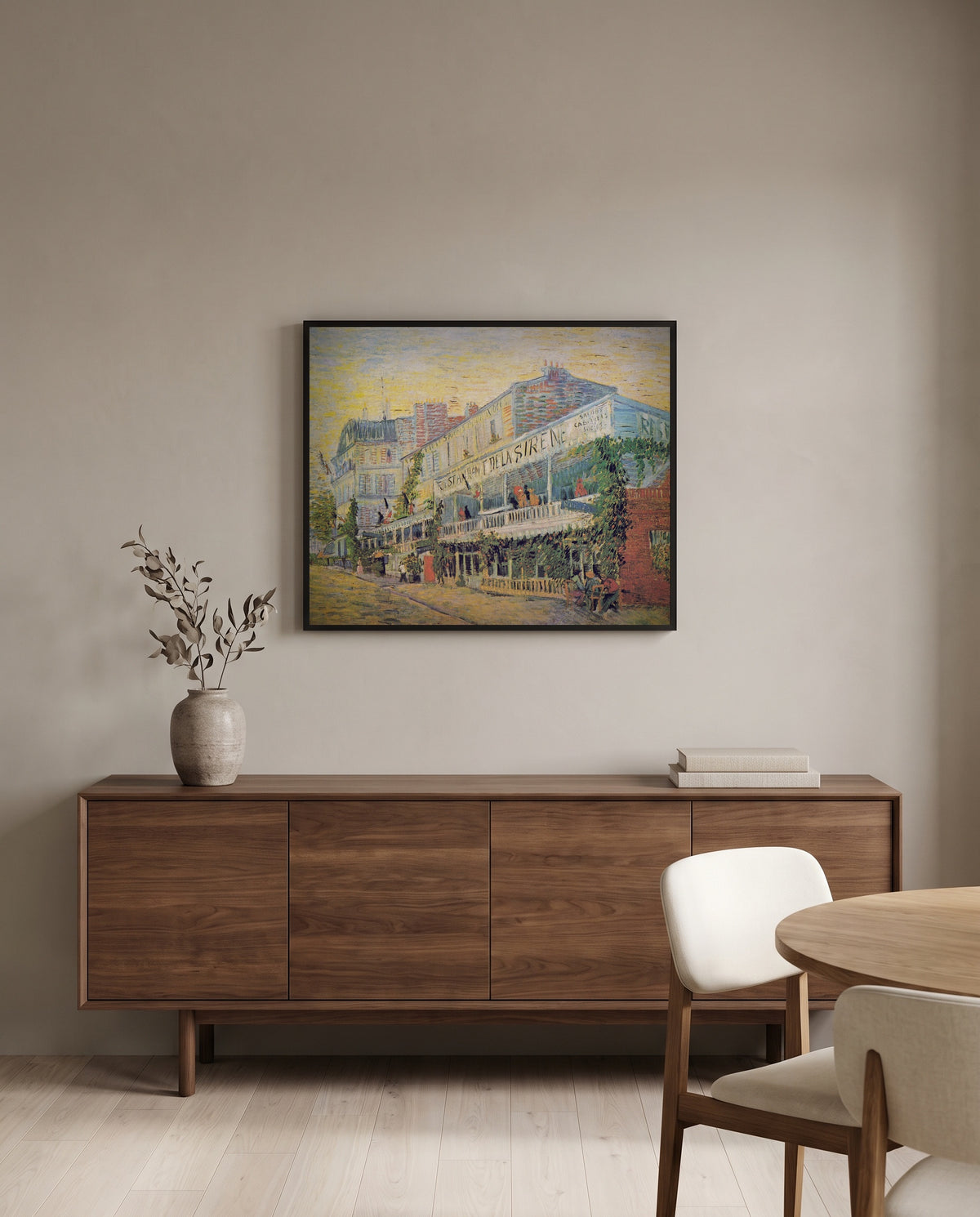 Restaurant de la Sirène by Vincent van Gogh in a black frame above a walnut sideboard in a dining room