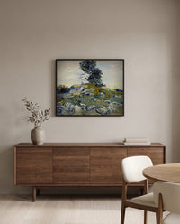 Rocks with Oak Tree by Vincent van Gogh in a black frame above a walnut sideboard in a dining room