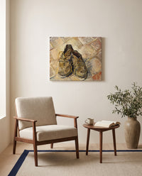 Shoes (1888) by Vincent van Gogh as a stretched canvas above a linen lounge chair in a reading corner