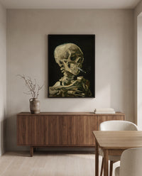 Skull with Burning Cigarette by Vincent van Gogh in a black frame above a walnut sideboard in a dining room