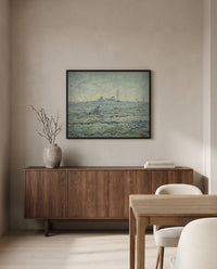 Snow-Covered Field with a Harrow by Vincent van Gogh in a black frame above a walnut sideboard in a dining room