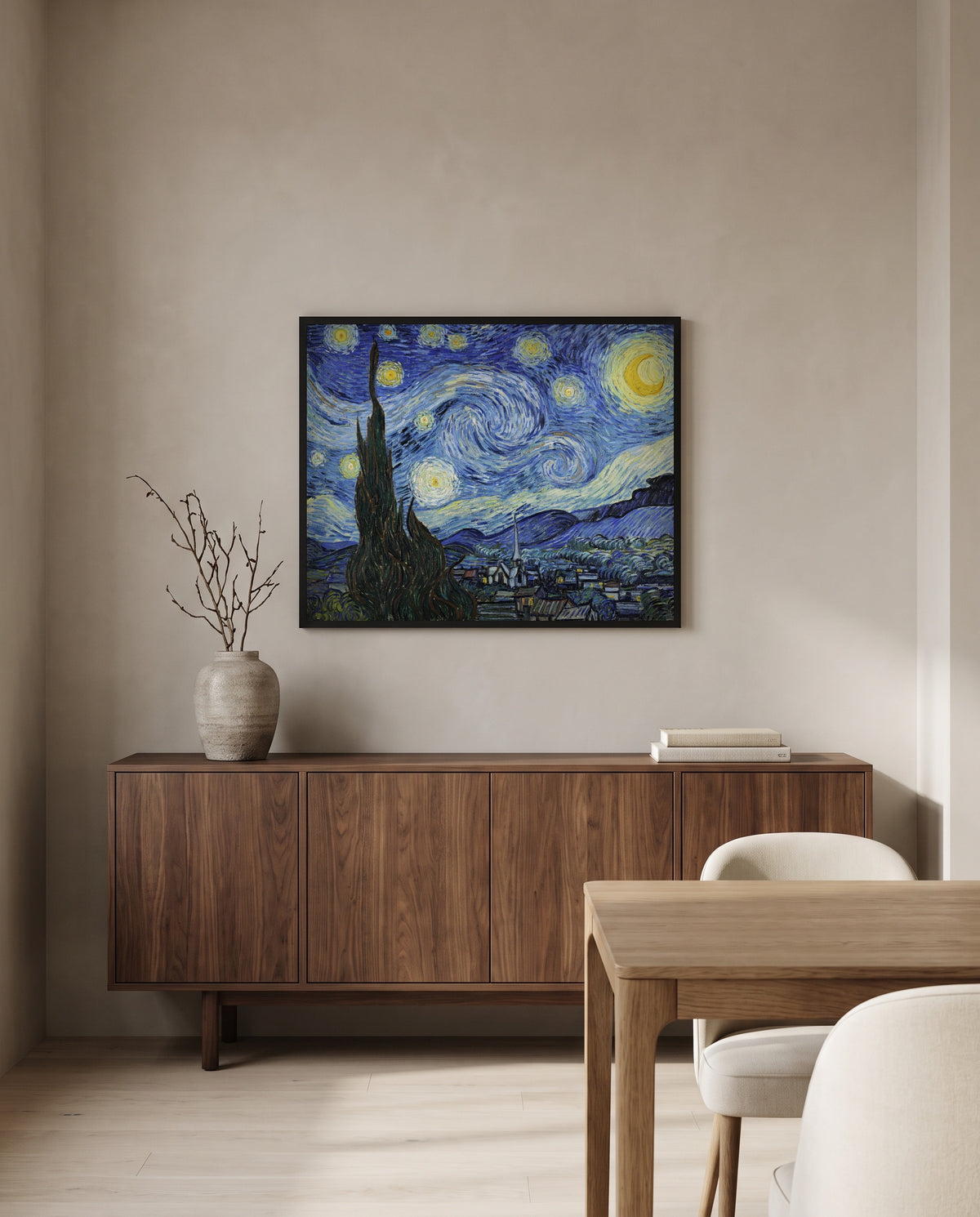The Starry Night by Vincent van Gogh in a black frame above a walnut sideboard in a dining room