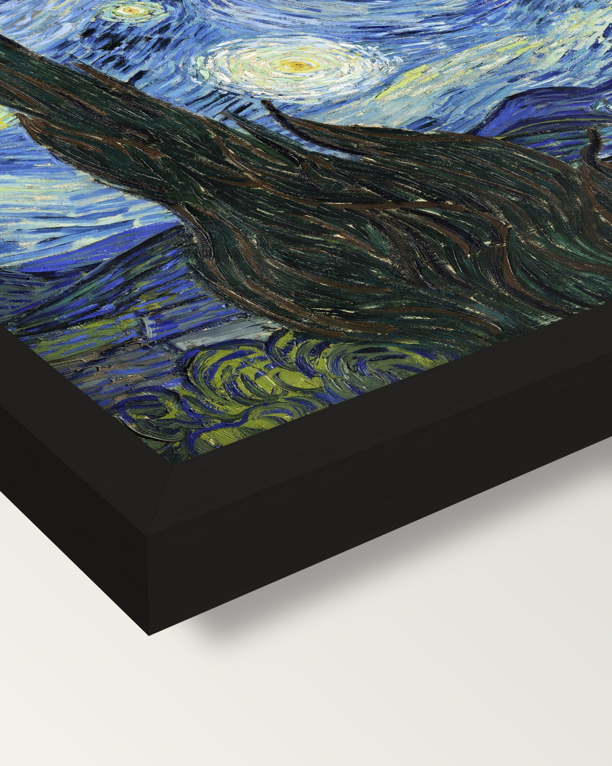 The Starry Night by Vincent van Gogh framed print, corner close-up: black moulding, mitred, the print set just below its edge