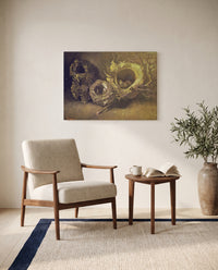 Three Birds’ Nests by Vincent van Gogh as a stretched canvas above a linen lounge chair in a reading corner