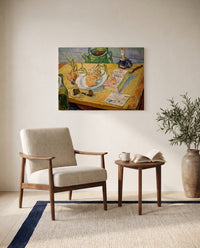 Still Life with Onions by Vincent van Gogh as a stretched canvas above a linen lounge chair in a reading corner