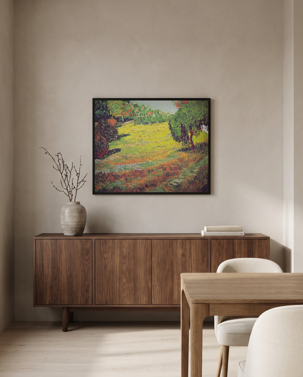 Sunny Lawn in a Public Park by Vincent van Gogh in a black frame above a walnut sideboard in a dining room