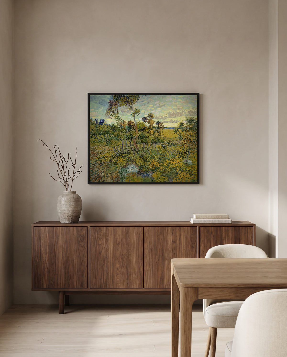 Sunset at Montmajour by Vincent van Gogh in a black frame above a walnut sideboard in a dining room