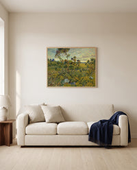 Sunset at Montmajour by Vincent van Gogh framed in natural oak above a cream sofa in a warm living room