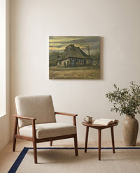 The Cottage by Vincent van Gogh as a stretched canvas above a linen lounge chair in a reading corner