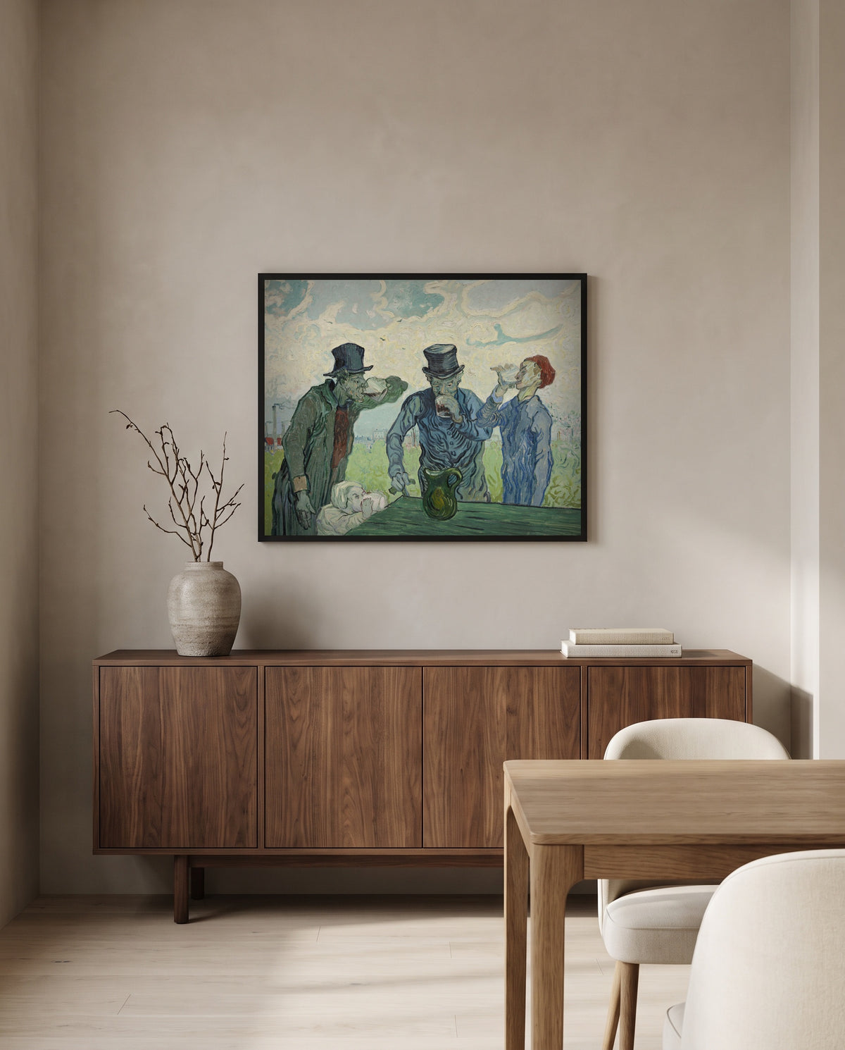 The Drinkers by Vincent van Gogh in a black frame above a walnut sideboard in a dining room