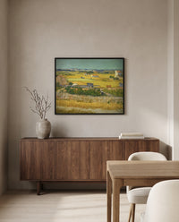 The Harvest by Vincent van Gogh in a black frame above a walnut sideboard in a dining room