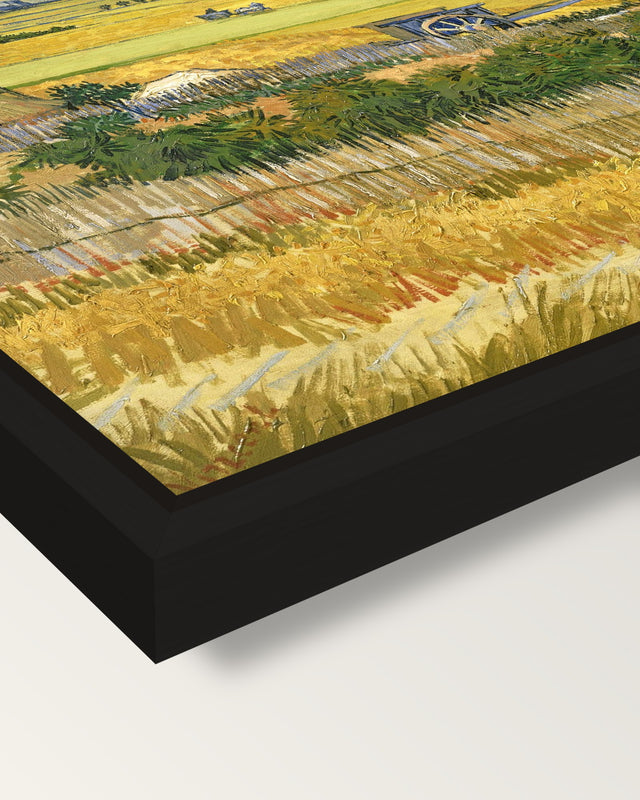 The Harvest by Vincent van Gogh framed canvas, corner close-up: a black floating frame with a shadow gap round the canvas