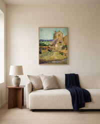 The Old Mill by Vincent van Gogh framed in natural oak above a cream sofa in a warm living room