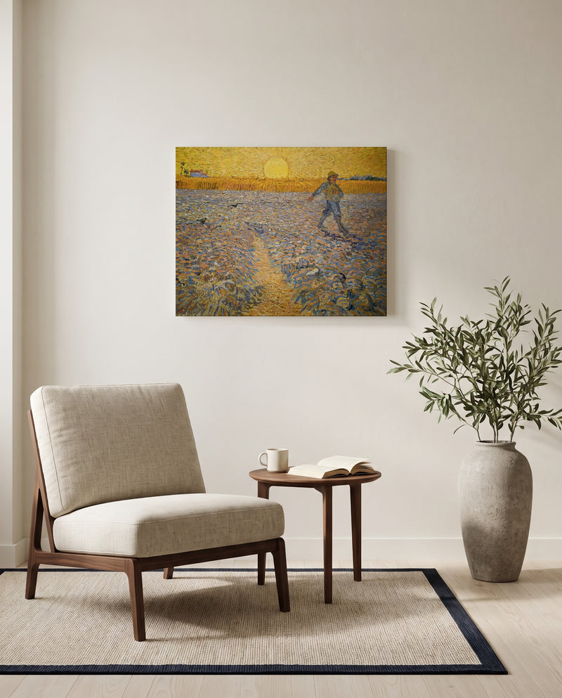 The Sower by Vincent van Gogh as a stretched canvas above a linen lounge chair in a reading corner