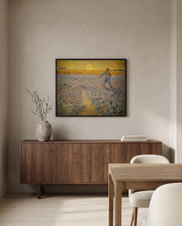 The Sower by Vincent van Gogh in a black frame above a walnut sideboard in a dining room