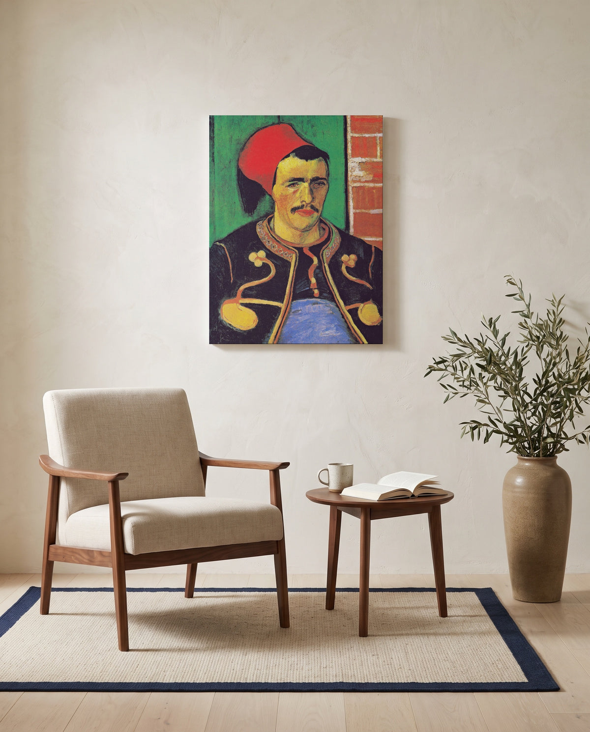 The Zouave by Vincent van Gogh as a stretched canvas above a linen lounge chair in a reading corner