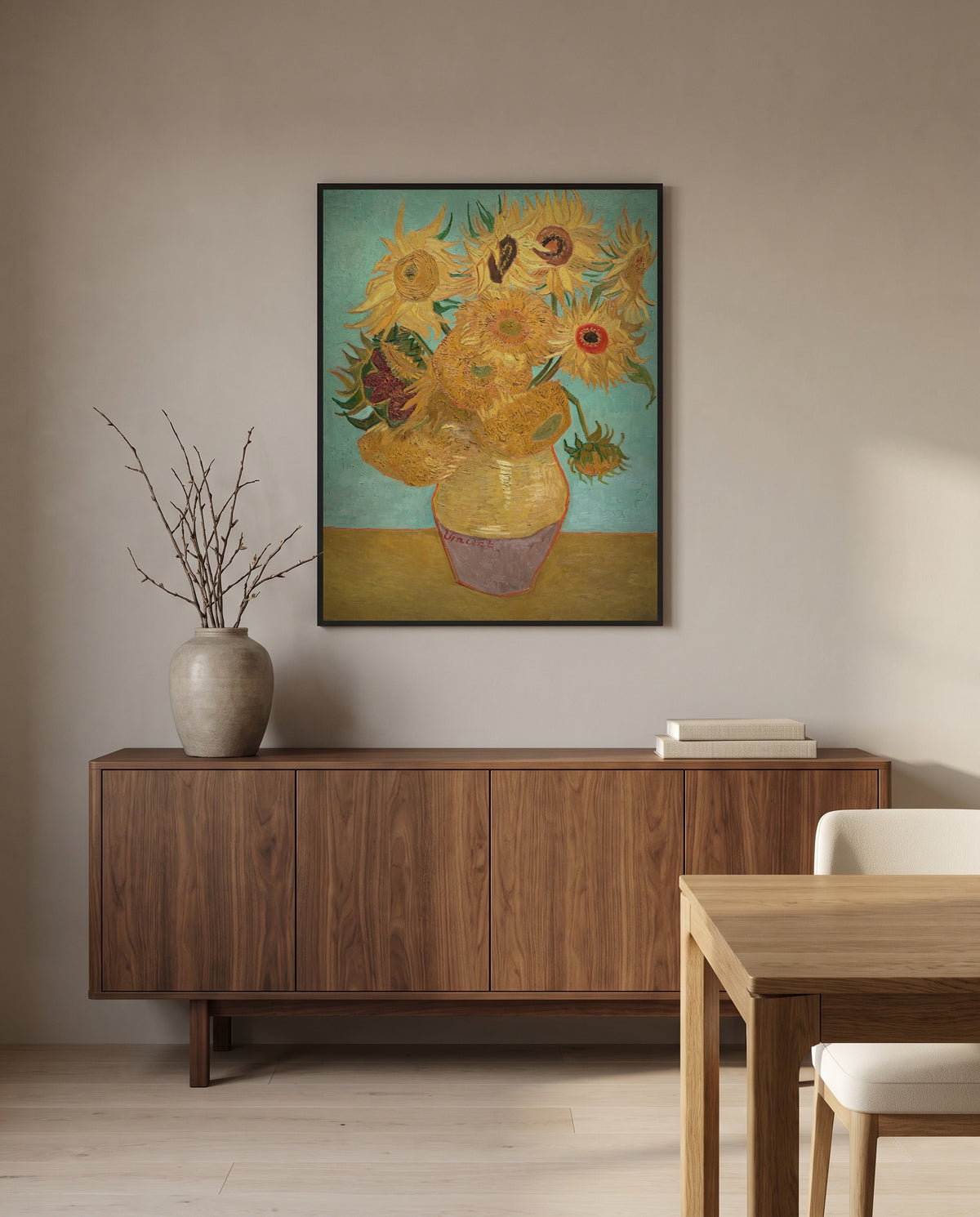 Twelve Sunflowers by Vincent van Gogh in a black frame above a walnut sideboard in a dining room