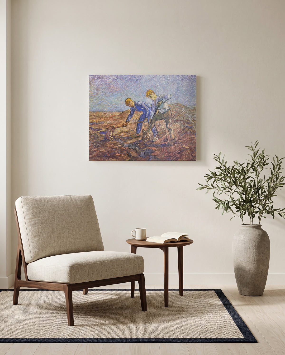 Two Peasants Digging by Vincent van Gogh as a stretched canvas above a linen lounge chair in a reading corner