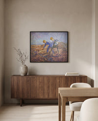 Two Peasants Digging by Vincent van Gogh in a black frame above a walnut sideboard in a dining room