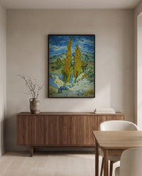 Two Poplars in the Alpilles by Vincent van Gogh in a black frame above a walnut sideboard in a dining room