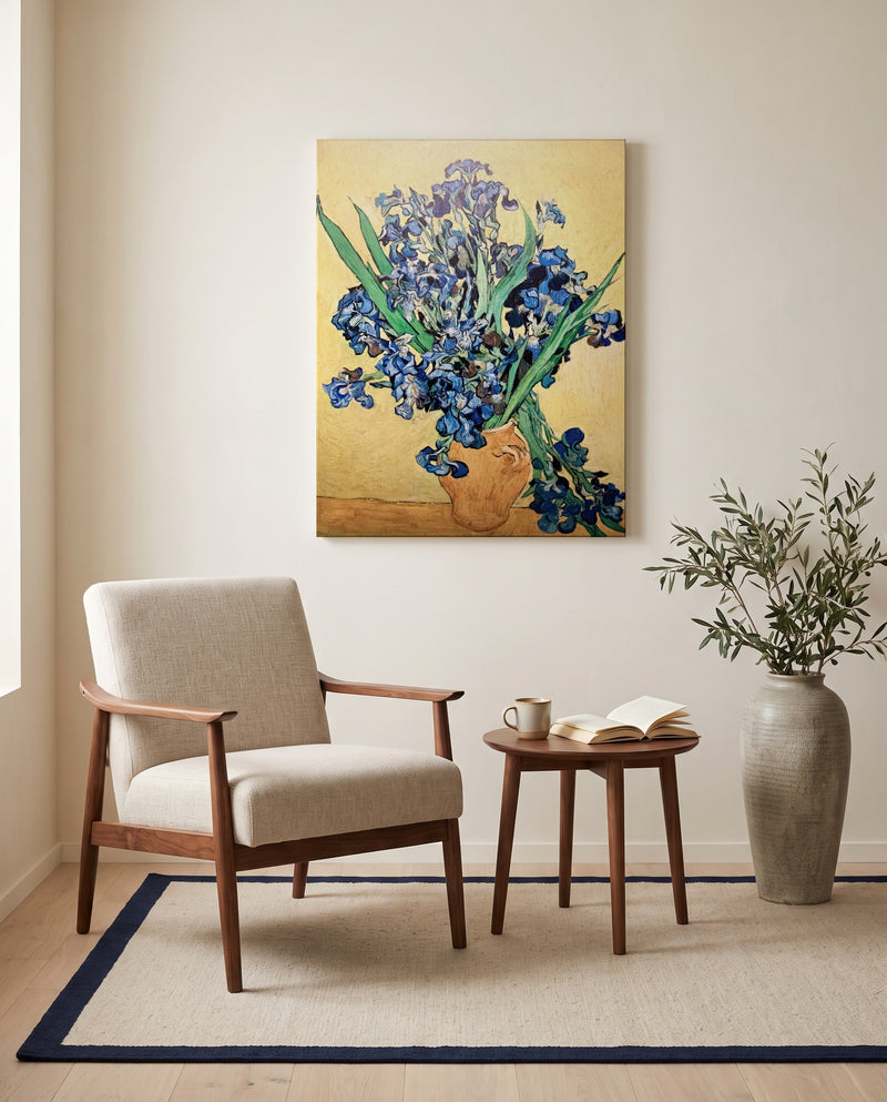 Vase with Irises by Vincent van Gogh as a stretched canvas above a linen lounge chair in a reading corner