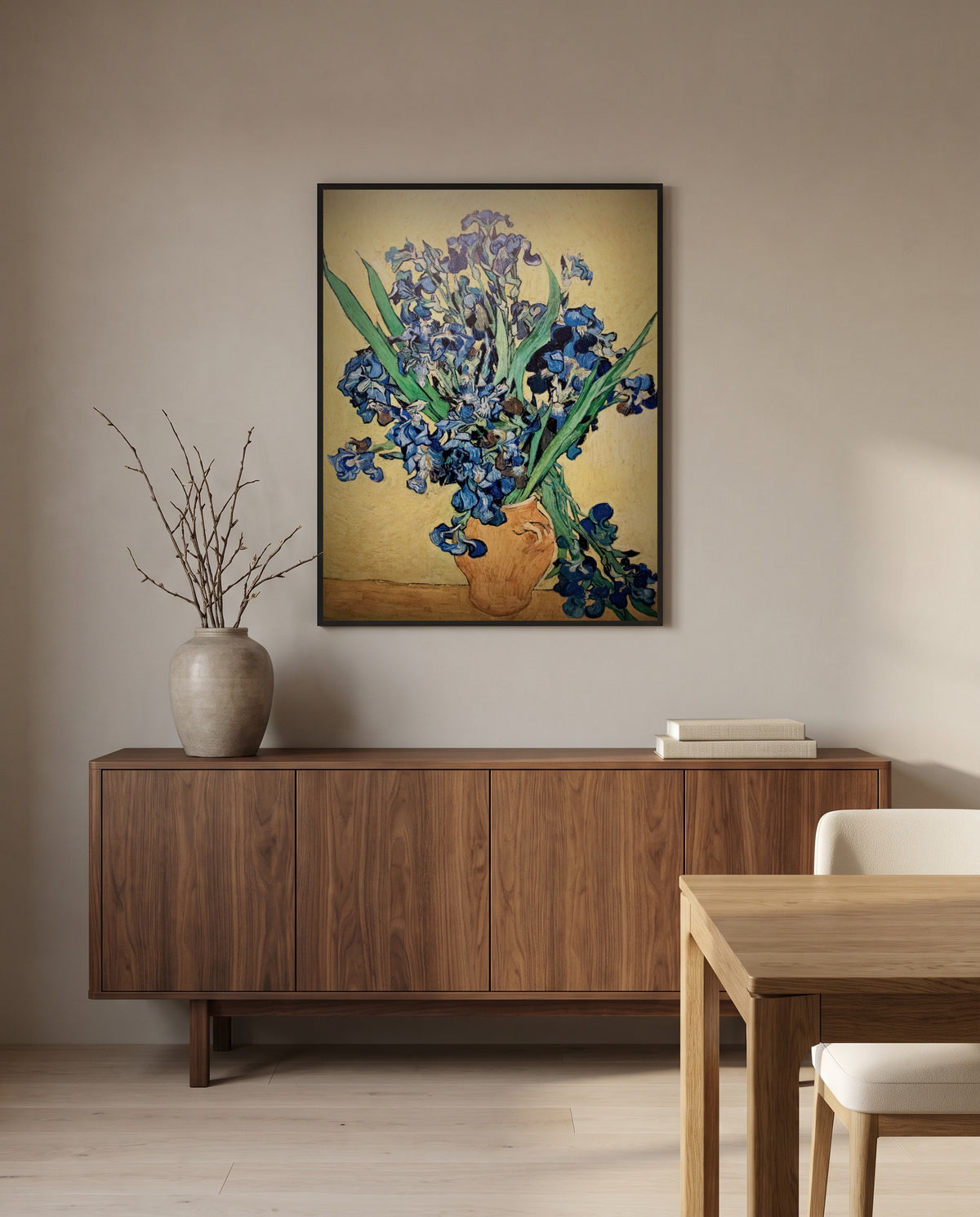Vase with Irises by Vincent van Gogh in a black frame above a walnut sideboard in a dining room