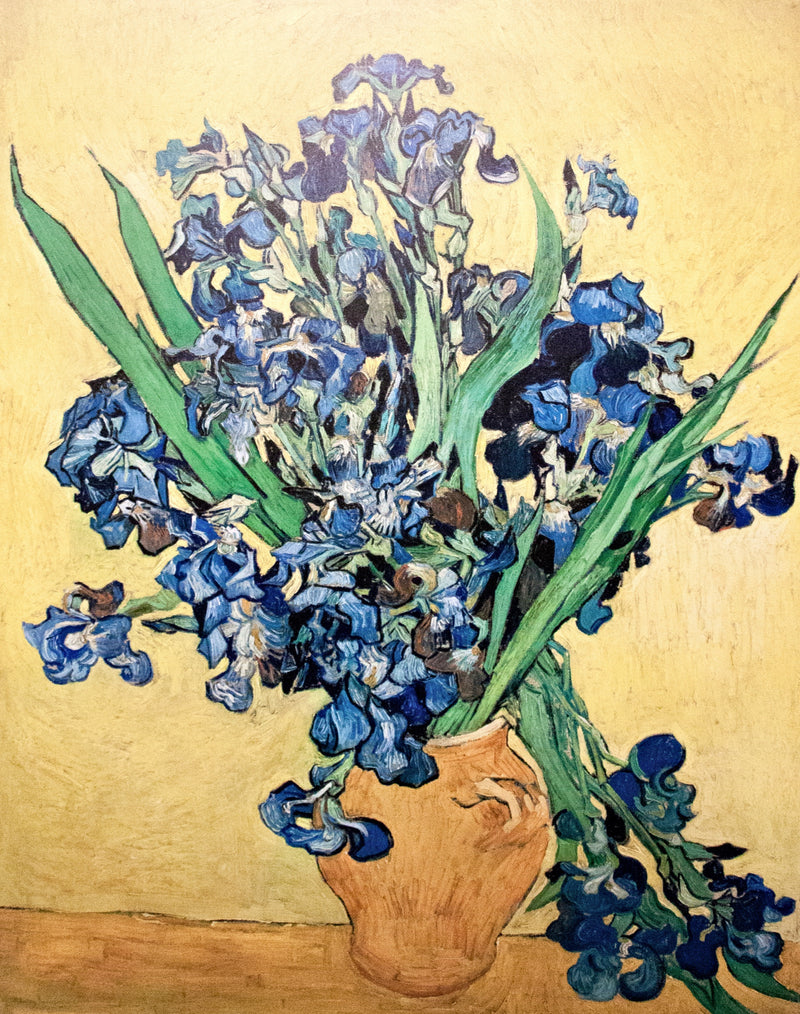 Vase with Irises against a Yellow Background by Van Gogh: violet-blue irises in a vase on a lemon-yellow ground