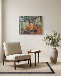 Ward in the Hospital in Arles by Vincent van Gogh as a stretched canvas above a linen lounge chair in a reading corner