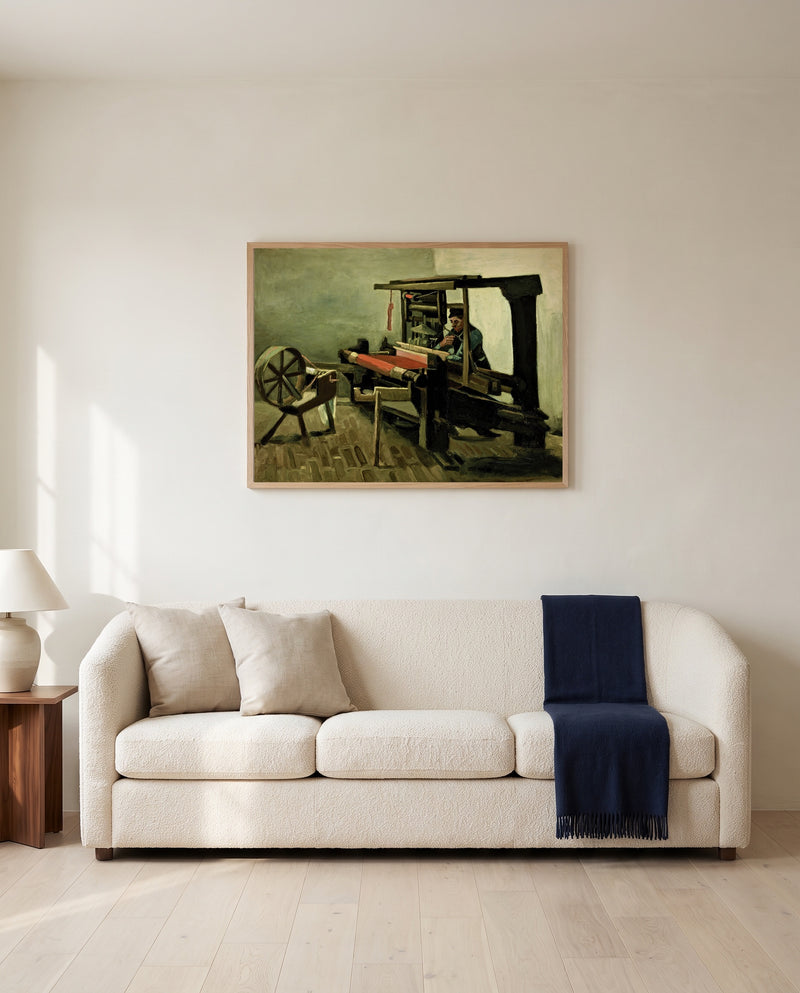 Weaver by Vincent van Gogh framed in natural oak above a cream sofa in a warm living room