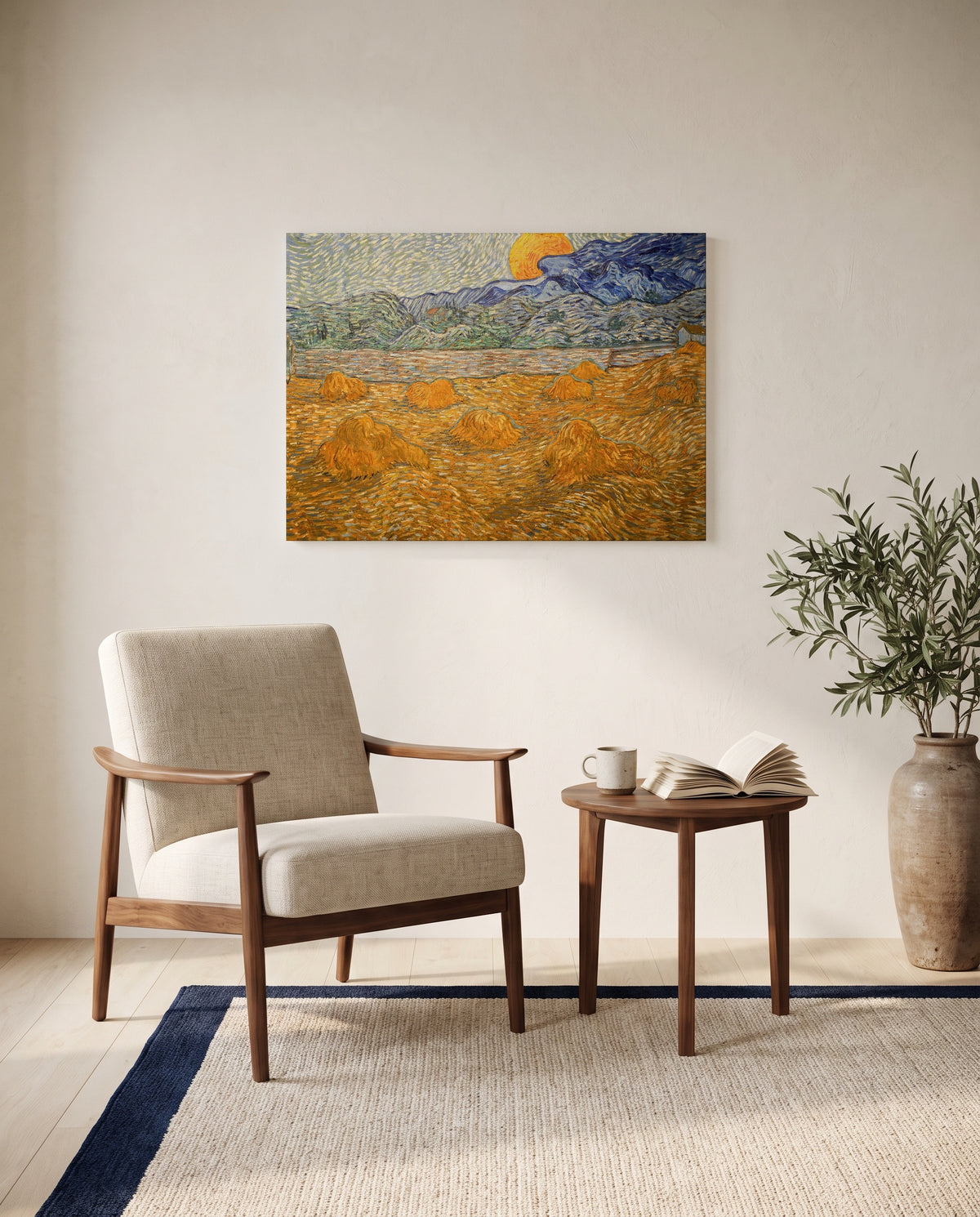 Wheat Sheaves and Rising Moon by Vincent van Gogh as a stretched canvas above a linen lounge chair in a reading corner