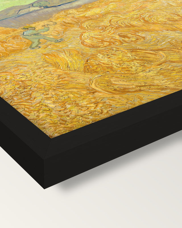 Wheatfield with a Reaper by van Gogh framed print, corner close-up: black moulding, mitred, the print set just below its edge