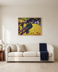 Houses at Murnau by Wassily Kandinsky framed in natural oak above a cream sofa in a warm living room