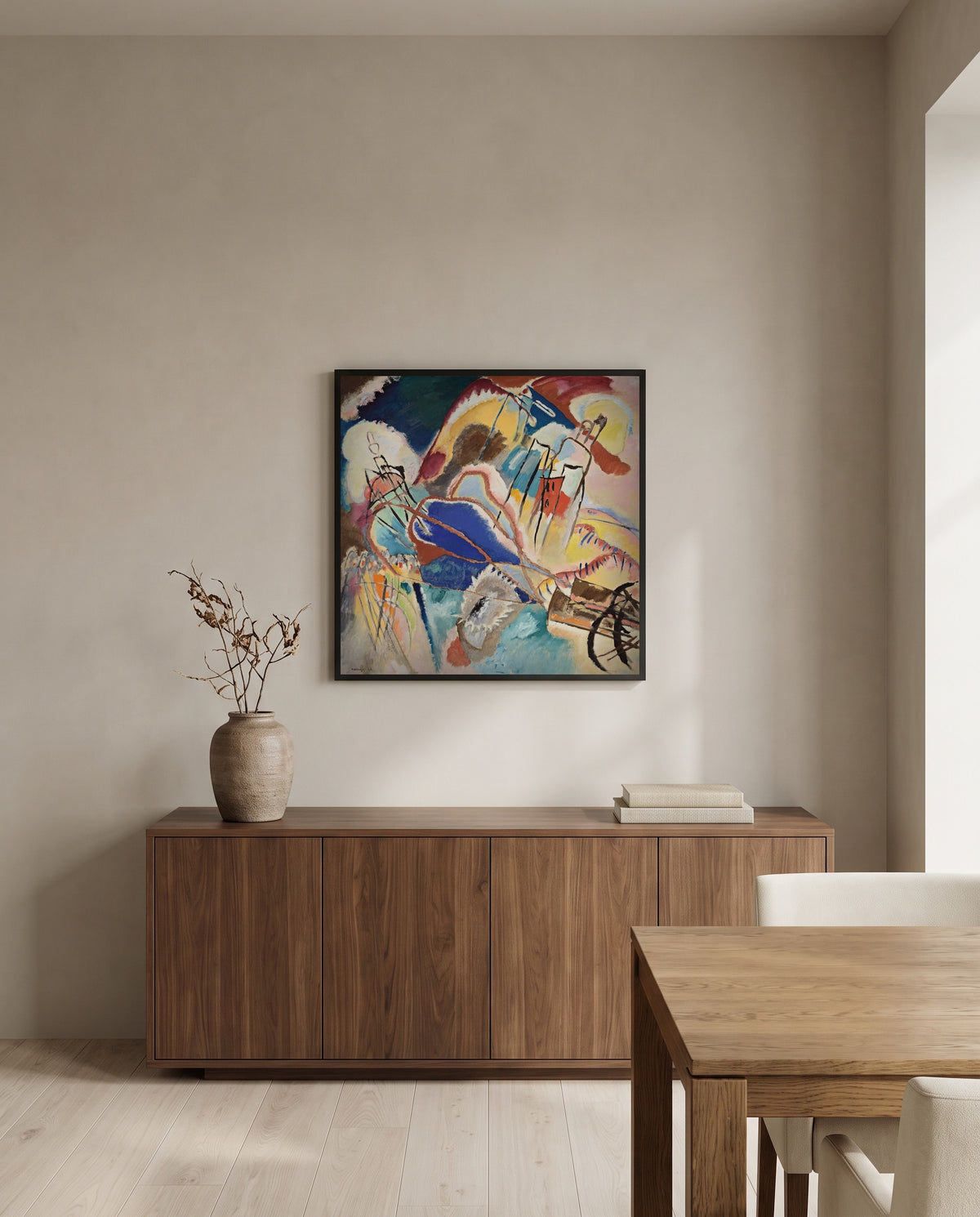 Improvisation No. 30 (Cannons) by Wassily Kandinsky in a black frame above a walnut sideboard in a dining room