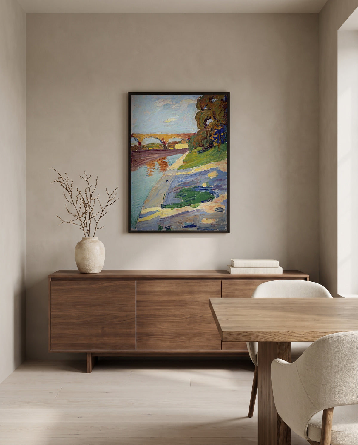 Munich – The Isar by Wassily Kandinsky in a black frame above a walnut sideboard in a dining room