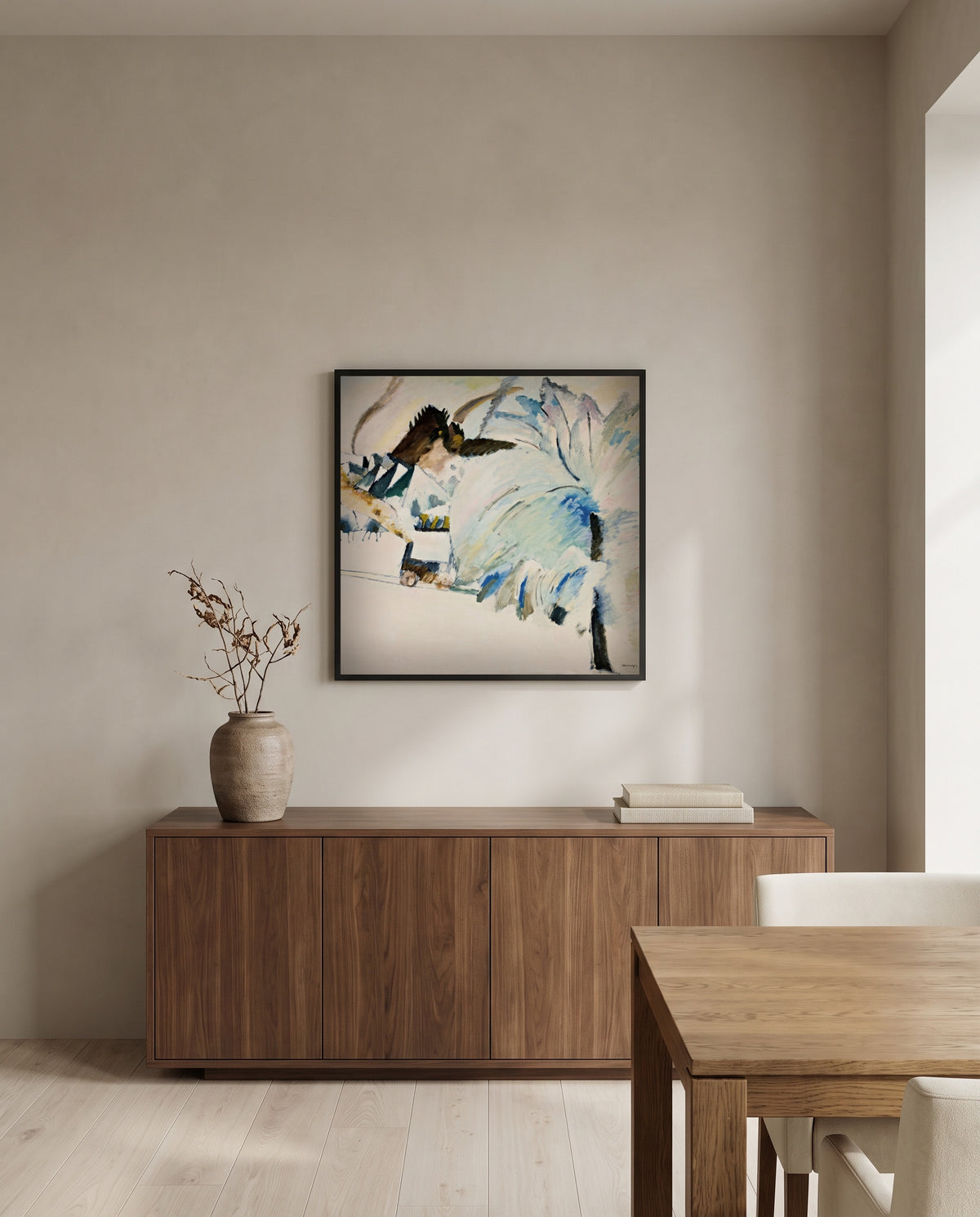 Murnau with Locomotive by Wassily Kandinsky in a black frame above a walnut sideboard in a dining room