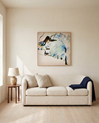 Murnau with Locomotive by Wassily Kandinsky framed in natural oak above a cream sofa in a warm living room