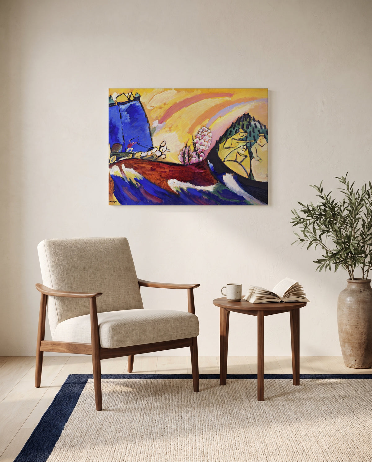 Painting with Troika by Wassily Kandinsky as a stretched canvas above a linen lounge chair in a reading corner
