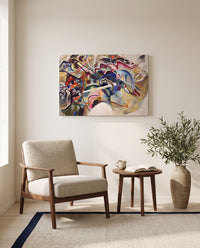 Painting with White Border by Wassily Kandinsky as a stretched canvas above a linen lounge chair in a reading corner