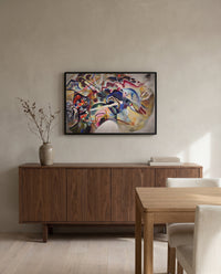 Painting with White Border by Wassily Kandinsky in a black frame above a walnut sideboard in a dining room