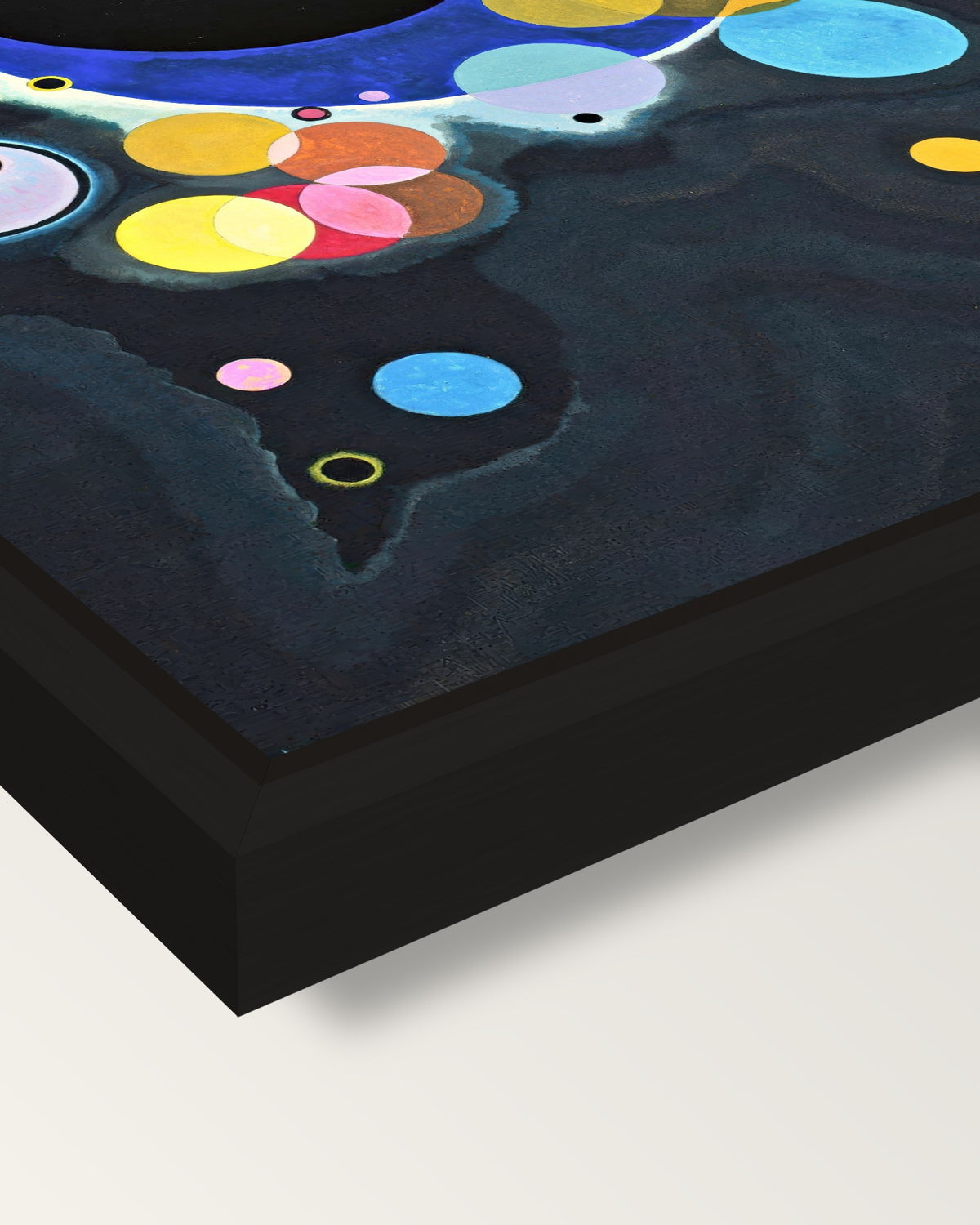 Several Circles by Kandinsky framed canvas, corner close-up: a black floating frame with a shadow gap round the canvas